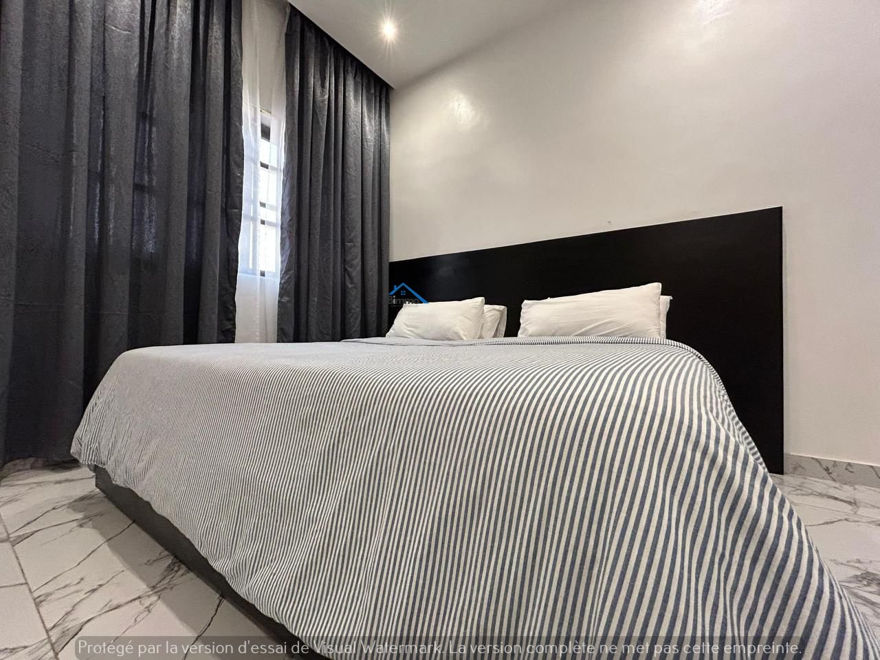 Kéona Résidence |Appartement Blacklodge | Carrefour Akogbato Cotonou - 2 Chambres Salon Entièrement Équipé